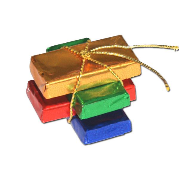 Datei:Abgepackte quaderschokolade in vier grundfarben.png